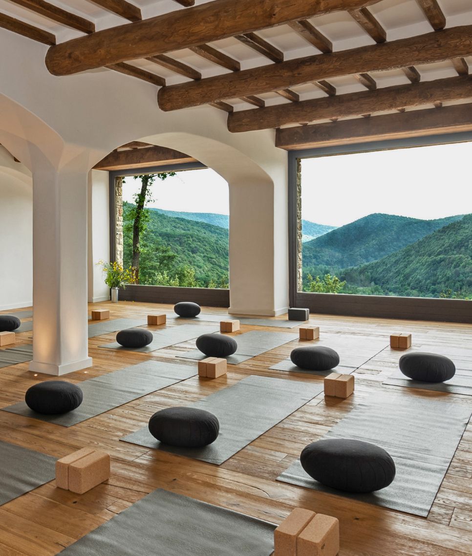 11 Hotels Enhancing Longevity Eremito Yoga Session