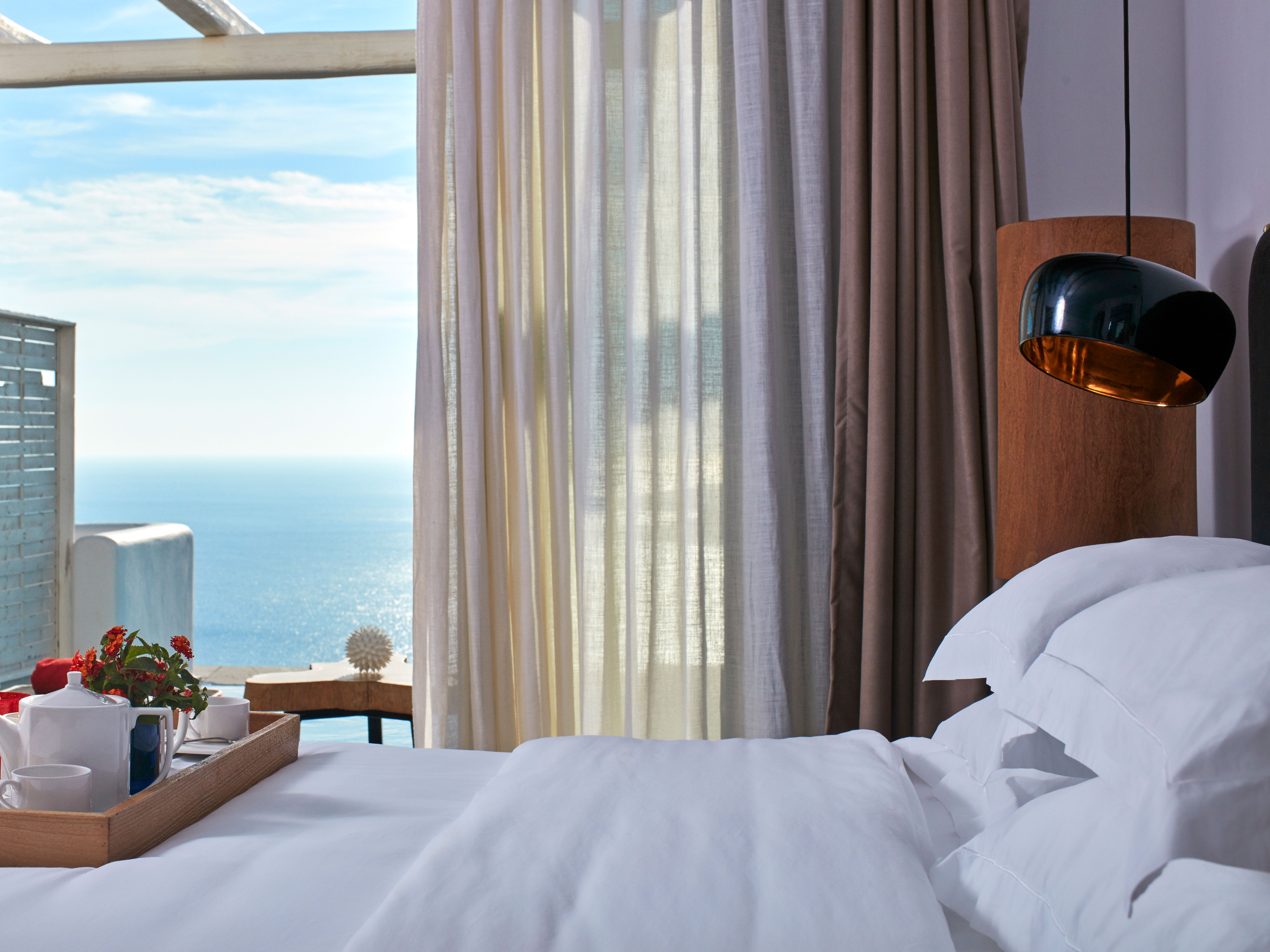 Myconian Avaton Bed Views in Mykonos