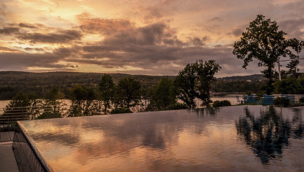 05 BP Well Being Destinations Seezeitlodge Hotel And Spa Pool Landscape View By Sundown